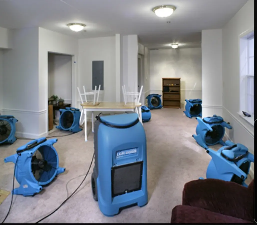 Air movers and dehumidifier setup for Water Extraction & Removal in Onalaska