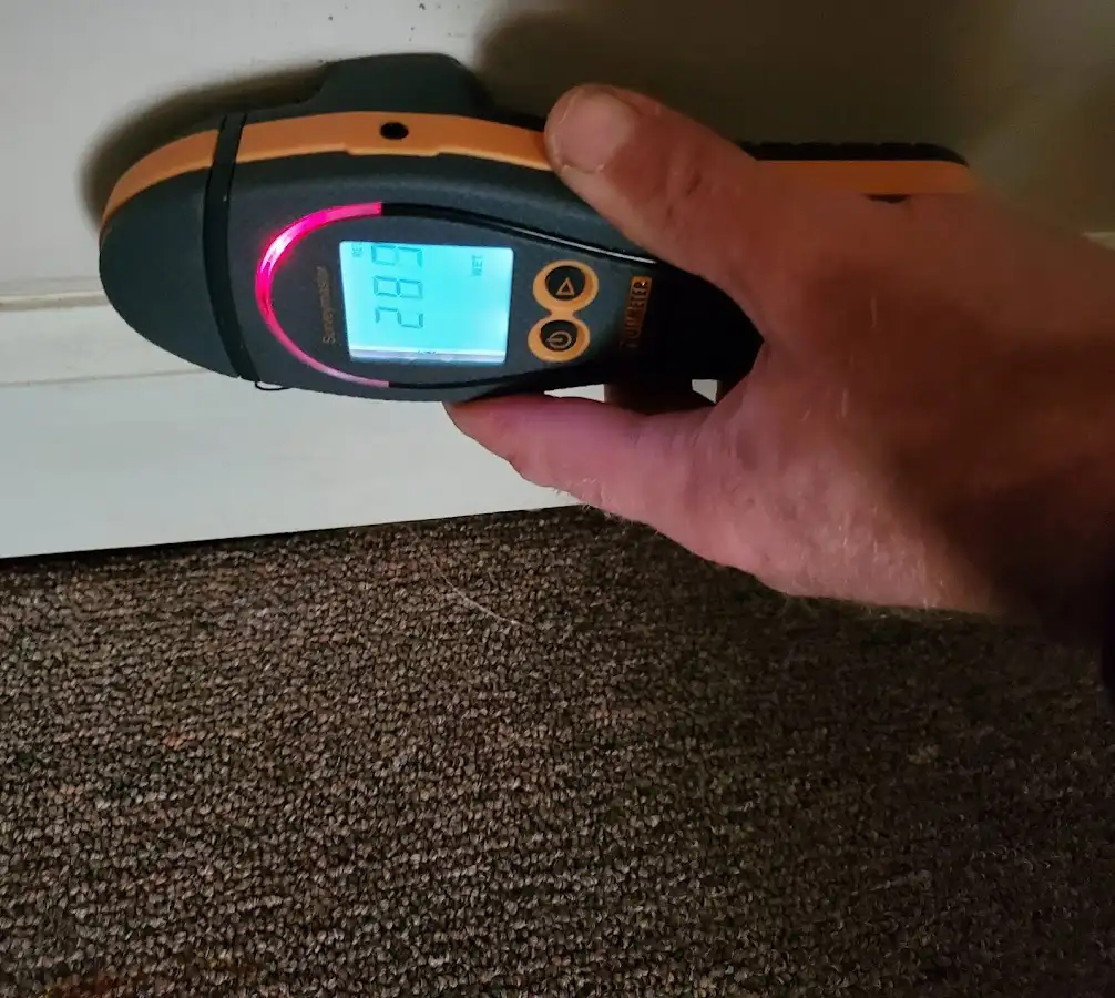 Moisture detection at baseboard during Burst Pipe Cleanup in Onalaska